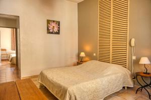 Hotels Au Saint Roch - Hotel et Jardin : photos des chambres