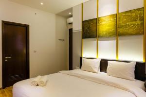 Elegant 2BR Apartment at M-Town Signature near Shopping Mall By Travelio