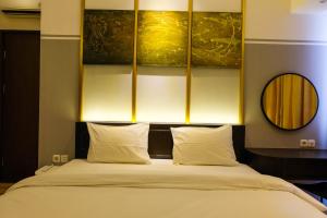 Elegant 2BR Apartment at M-Town Signature near Shopping Mall By Travelio