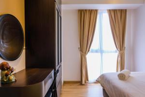 Elegant 2BR Apartment at M-Town Signature near Shopping Mall By Travelio