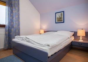 Welcome in - Appartement 4-17 met balkon, berging en houtkachel