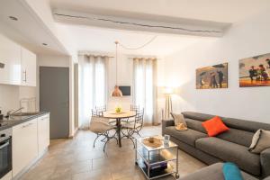 Appartements Suite Oisivite classee 3 etoiles avec Terrasse, Climatisation : photos des chambres