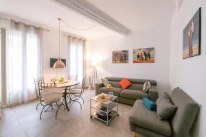 Appartements Suite Oisivite classee 3 etoiles avec Terrasse, Climatisation : photos des chambres