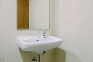 Best Price 1BR Apartment at The Oasis Cikarang By Travelio