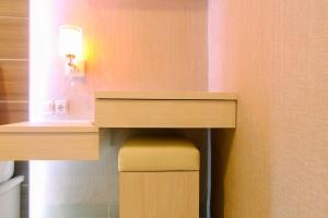 Best Price 1BR Apartment at The Oasis Cikarang By Travelio