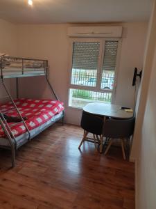 Appartements Studio a 1 kilometre de Disneyland Paris : photos des chambres