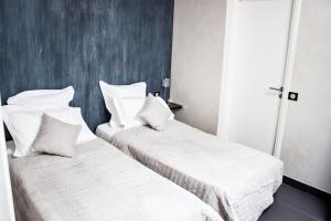 Appartements Residence du Louvre - Apartments - Prime location Palais & Croisette - Luxury Stay by LRA Cannes : photos des chambres