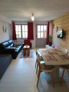 Appartements Les vignes : photos des chambres