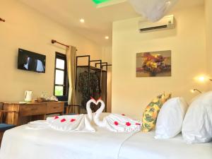 Phòng Có Giường Cỡ Queen Nhìn Ra Hồ Bơi (Queen Room with Pool View)