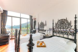 Standard Twin Room with Sea View and Balcony room in Pousada de Coloane Boutique Hotel