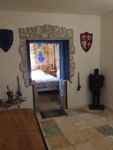 Appartements Le Griffon Medieval : photos des chambres