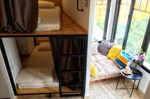 Bed in 8-Bed Female Dormitory Room room in Hostal Numero Trece