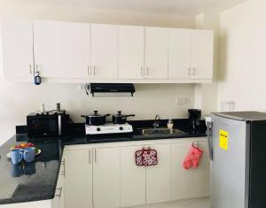 PHILGLO CONDOTELS DOT ACCREDITED The Manors at the Courtyards