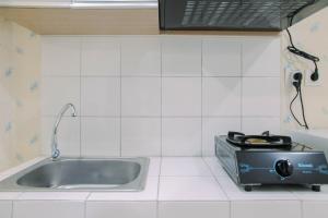 Modern Furnished Studio at Springlake Summarecon Bekasi Apartment By Travelio