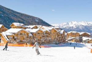 Appart'hotels Madame Vacances Residence Le Parc Des Airelles : photos des chambres