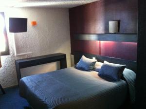 Hotels Hotel les Tourrades : photos des chambres