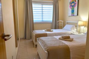 La Perla Beach Apt with Pool