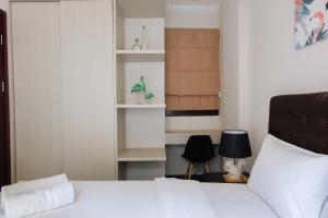 Minimalist and Cozy Room 1BR Asatti Apartment By Travelio