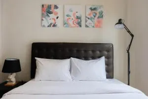 Minimalist and Cozy Room 1BR Asatti Apartment By Travelio - Legok