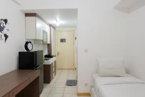 Cozy Room Studio Apartment M-Town Residence By Travelio