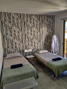 Double or Twin Room with Shared Bathroom room in Málaga Centro Hostel