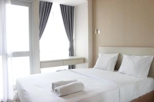 Minimalist Studio Room Taman Melati Apartment Jatinangor By Travelio