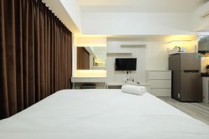 Elegant Studio at Springlake Summarecon Bekasi Apartment By Travelio
