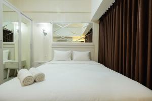 Elegant Studio at Springlake Summarecon Bekasi Apartment By Travelio