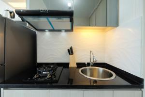 Elegant Studio at Springlake Summarecon Bekasi Apartment By Travelio