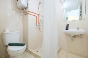 Elegant Studio at Springlake Summarecon Bekasi Apartment By Travelio