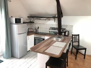 Appartements Les gites du Clos Saint-Martin : photos des chambres