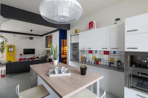 Appartements Le 32 by Cocoonr : photos des chambres