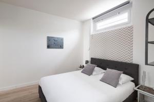 Appartements Le 32 by Cocoonr : photos des chambres