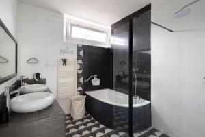 Appartements Le 32 by Cocoonr : photos des chambres