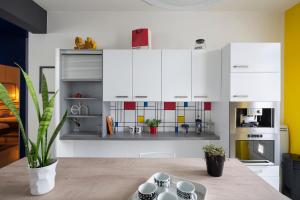 Appartements Le 32 by Cocoonr : photos des chambres