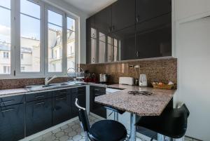 Appartements Veeve - Light by Les Halles : photos des chambres