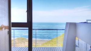 Casa con Hot Tub vista panorámica y sendero de bajada a la playa