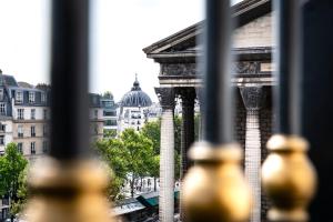 Parisian Suite (2 Adults + 1 Child) room in Hôtel Madeleine Plaza
