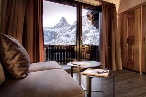 Superior Double Room with Panoramic Matterhorn View and Balcony room in The Christiania Mountain Spa Resort