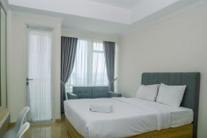 Modern and Cozy Studio Menteng Park Apartment By Travelio