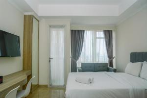 Modern and Cozy Studio Menteng Park Apartment By Travelio