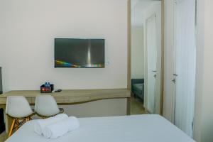 Modern and Cozy Studio Menteng Park Apartment By Travelio