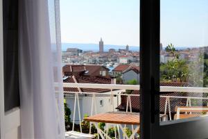 Double Room with Balcony and Sea View room in Rab Citty Vieew Roomms