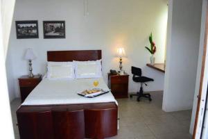 NAH SAM CHAK La Casa Rosada