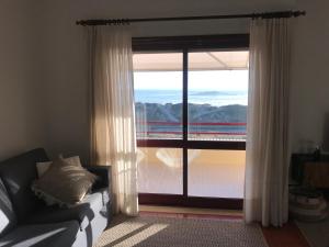 Beachfront Apartment with Swimming Pool