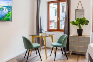 Appartements Travel Homes - L'Arsenal, studios en hyper centre : photos des chambres