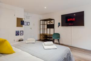 Appartements Travel Homes - L'Arsenal, studios en hyper centre : photos des chambres