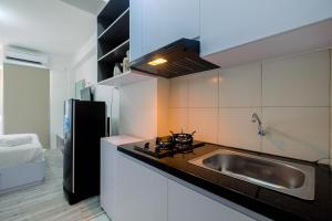 Affordable Price Studio at Riverview Jababeka Apartment Cikarang By Travelio