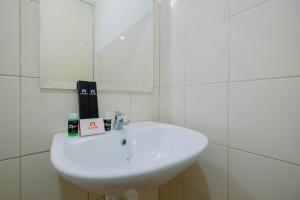 Affordable Price Studio at Riverview Jababeka Apartment Cikarang By Travelio