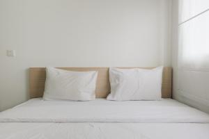 Elegant 1BR Apartment at Casa De Parco near AEON Mall By Travelio